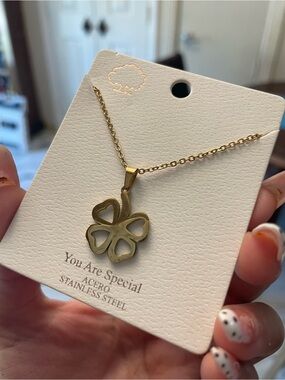 Four-Leaf Clover Pendant Necklace with Heart Cutouts
